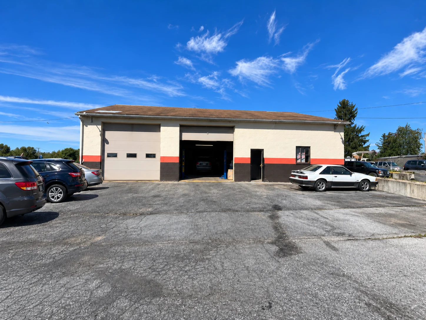 The Eashs repair garage and parking area